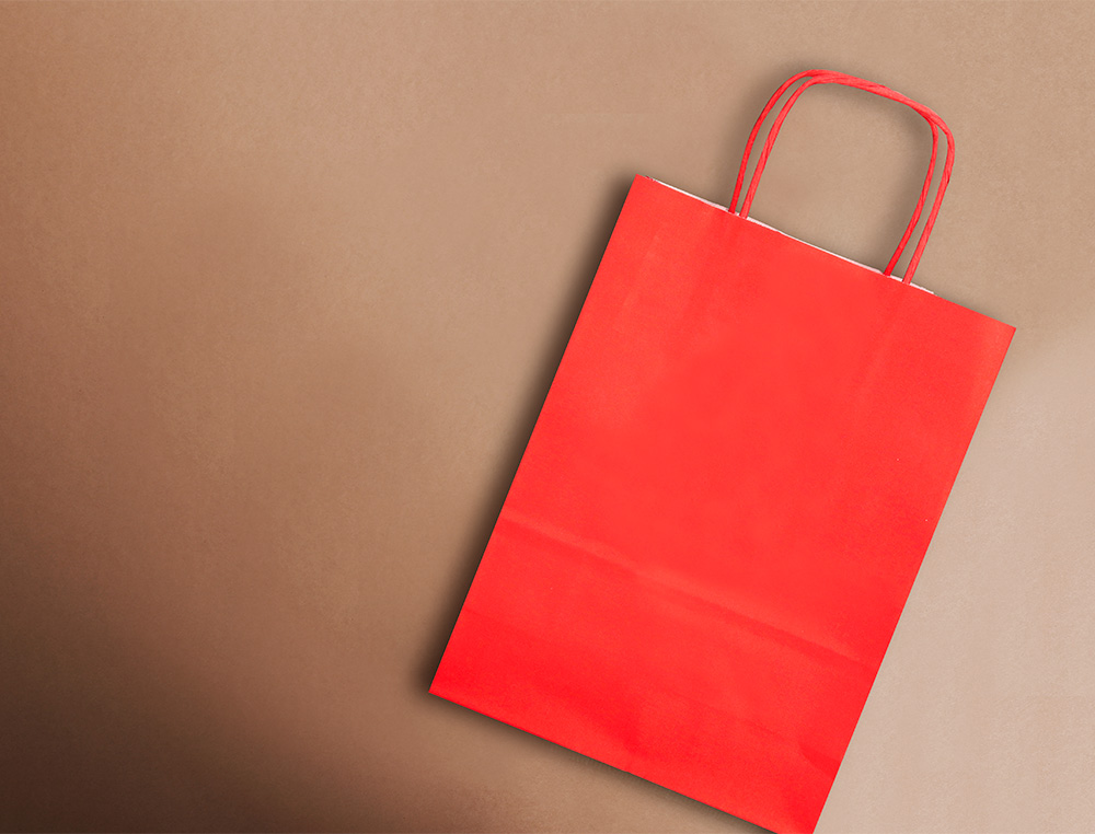 Q-CONNECT - BOLSA PAPEL CELULOSA ROJO M CON ASA RETORCIDA 270X370X12 MM (Ref.KF03751)